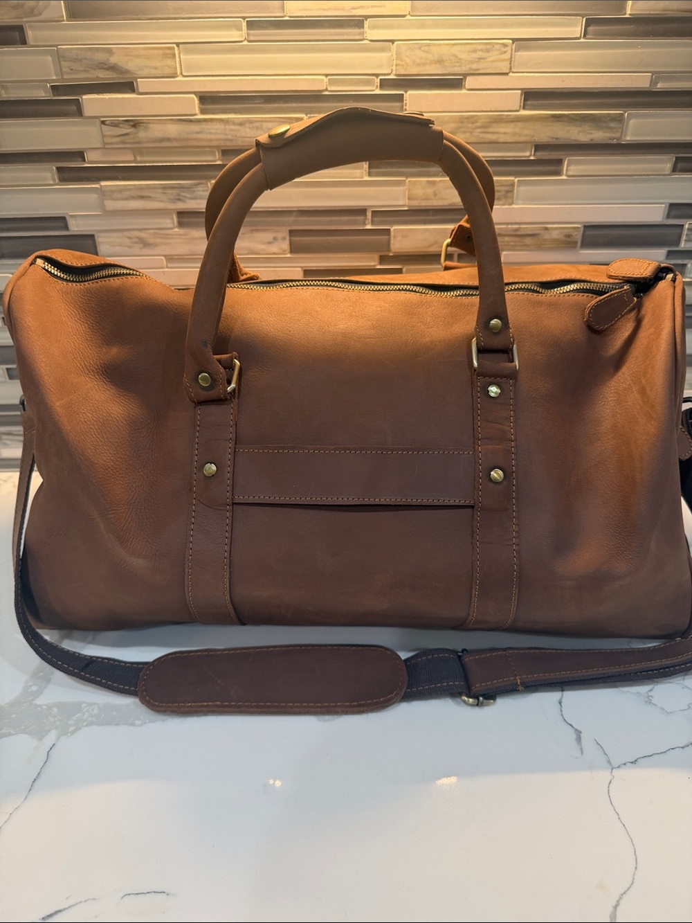 Classic Brown Leather Duffel Bag with Shoulder Strap